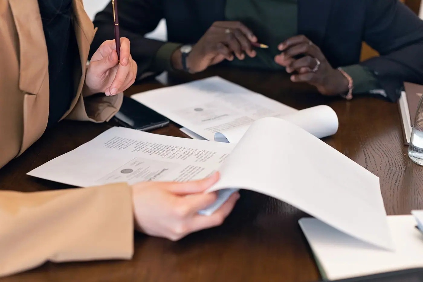 Close-up of documents being reviewed during a meeting