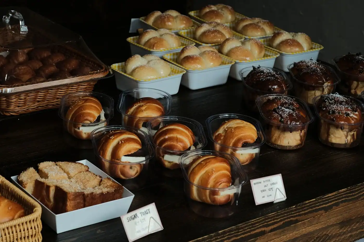 A variety of artisan baked goods on display in a bakery