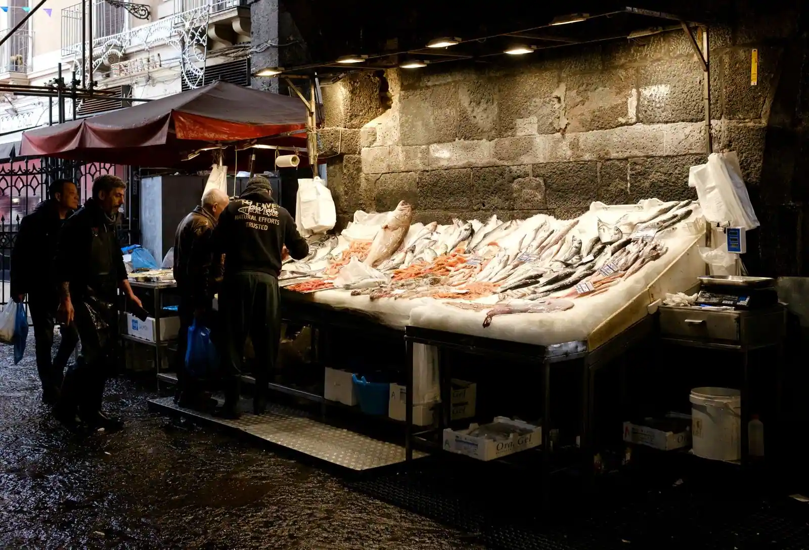 Street fish market scene in Catania