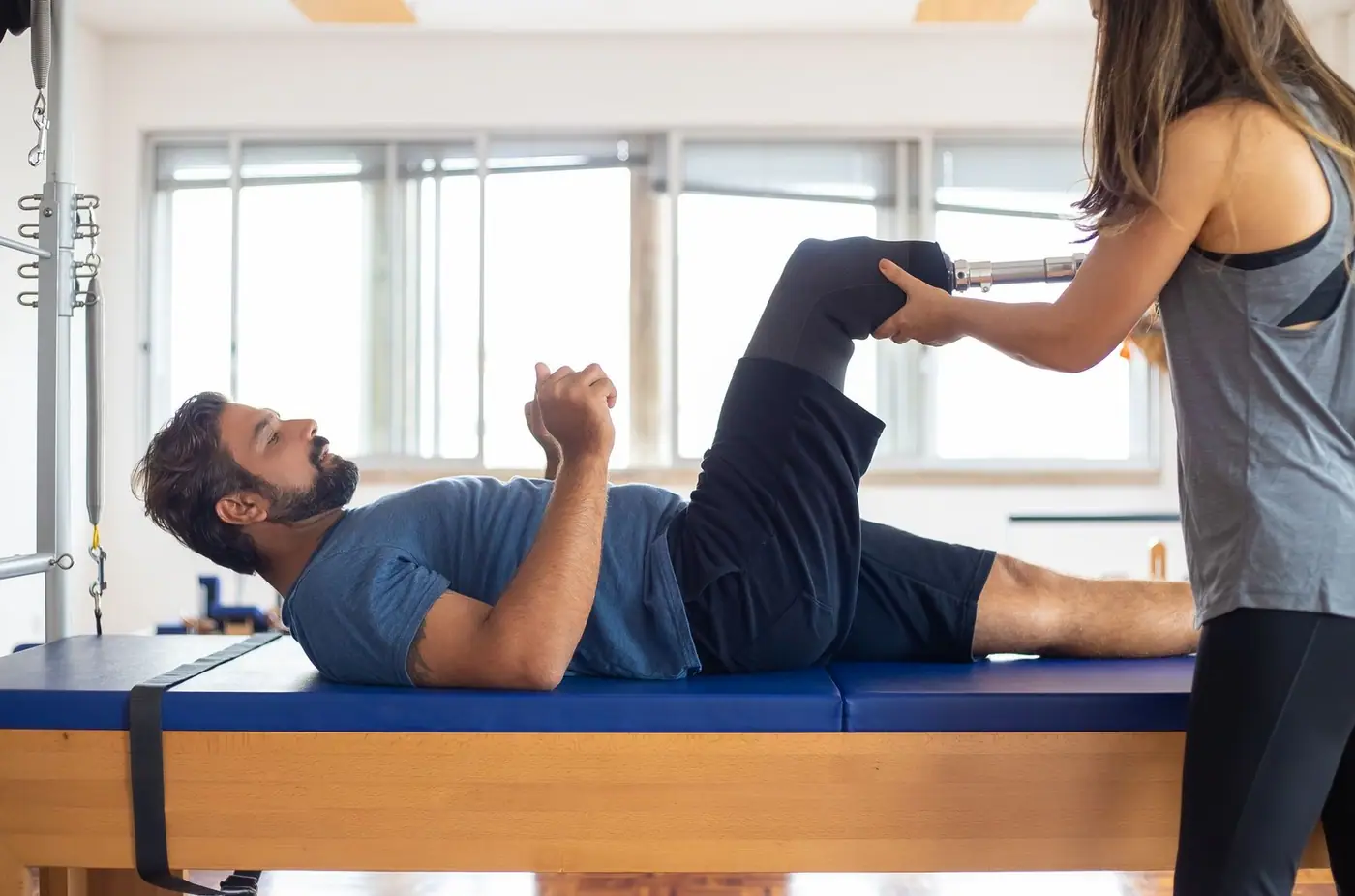 A man and a woman during a physical therapy session