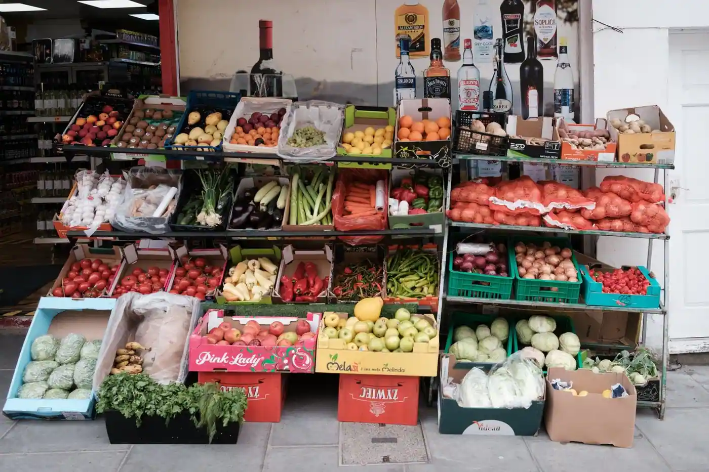 A vibrant display of fresh fruits and vegetables on a market stall