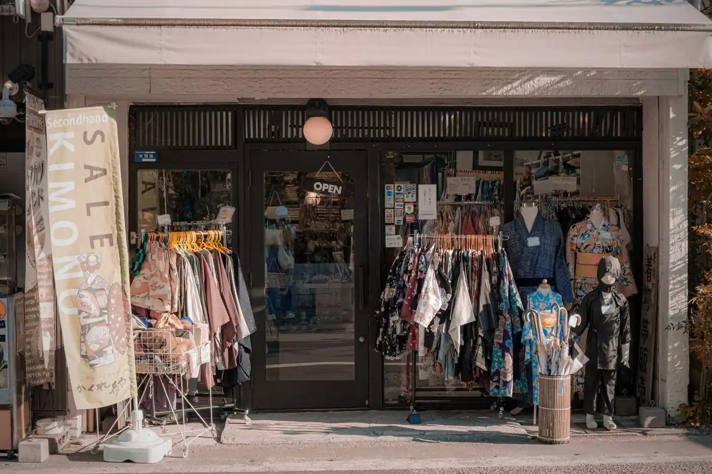 Rails of traditional patterned garments in a secondhand kimono store in Kyoto