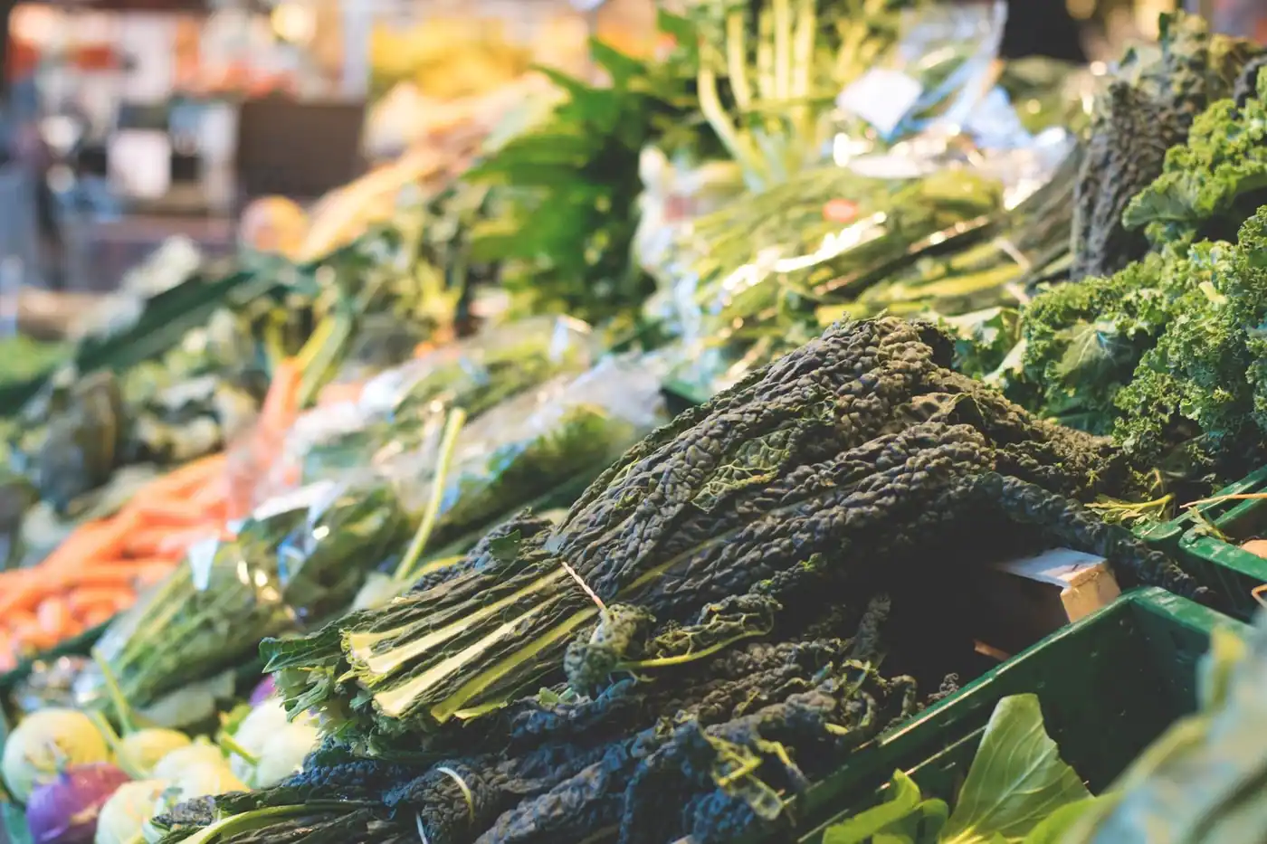 A vibrant display of fresh vegetables on a market stall