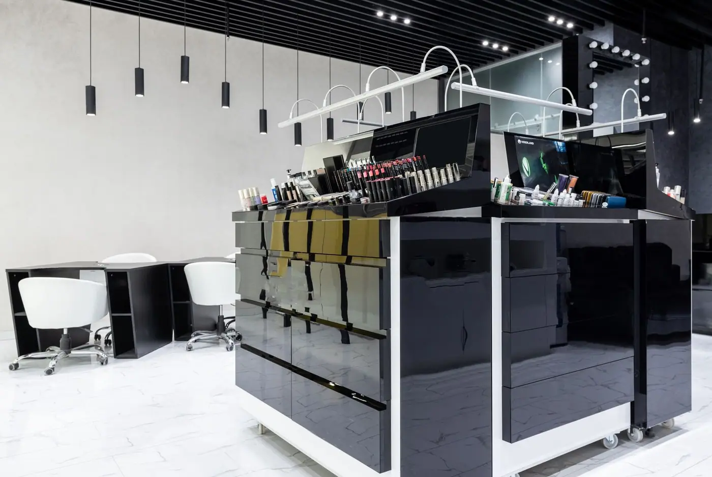 Sleek and luxurious salon interior featuring modern cosmetics display and elegant lighting.