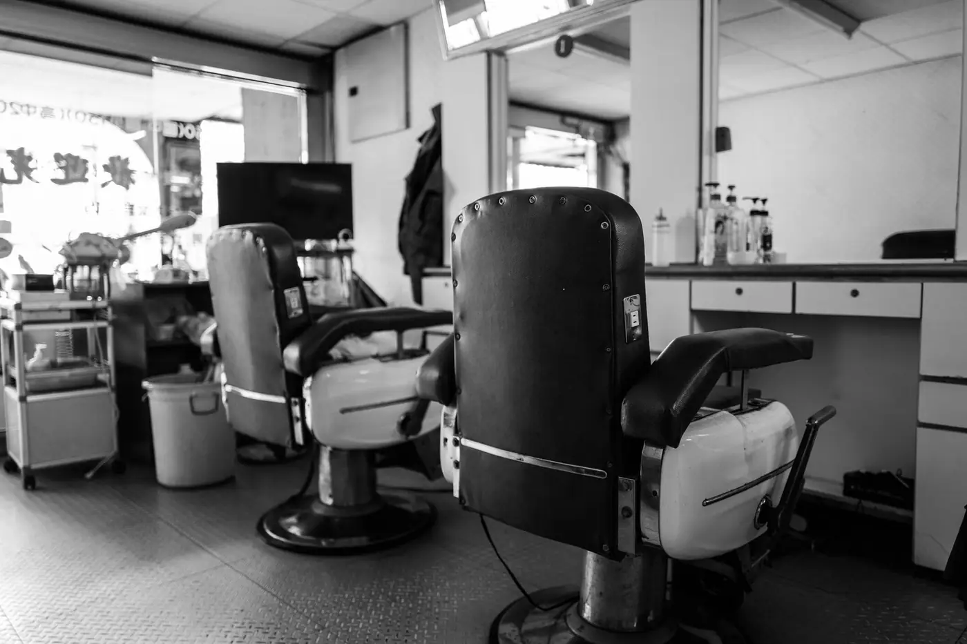 Classic salon chairs and mirrors in black and white