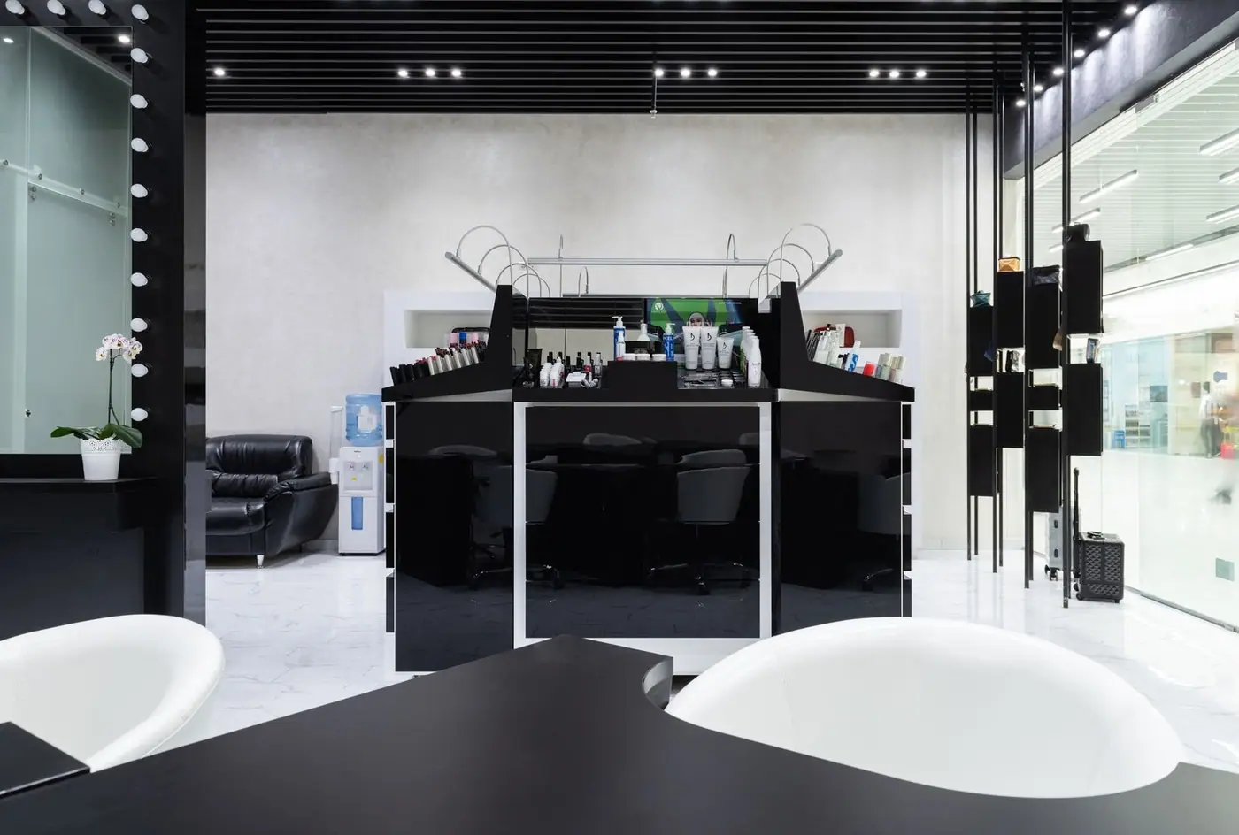 Chic modern beauty salon with black and white decor